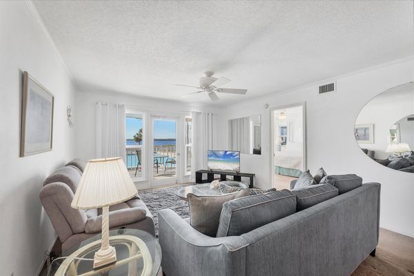 Open living space overlooking the community pool and Myakka River