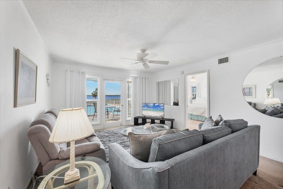 Open living space overlooking the community pool and Myakka River