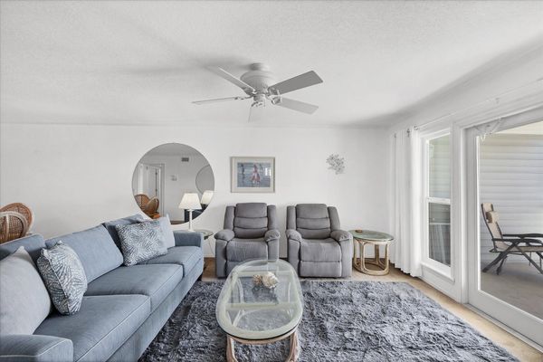 Open living space overlooking the community pool and Myakka River