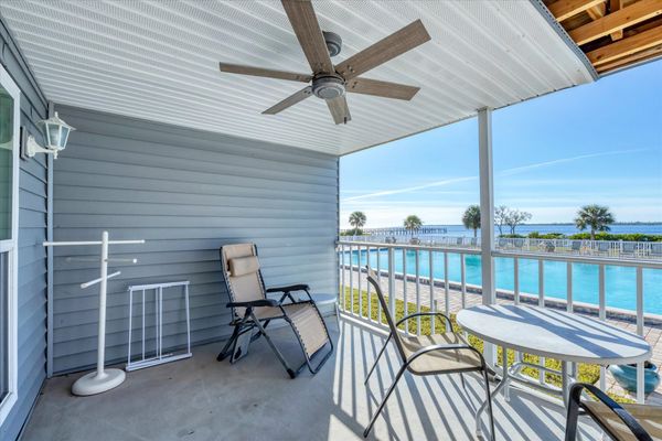 Private balcony overlooking the community pool and Myakka River