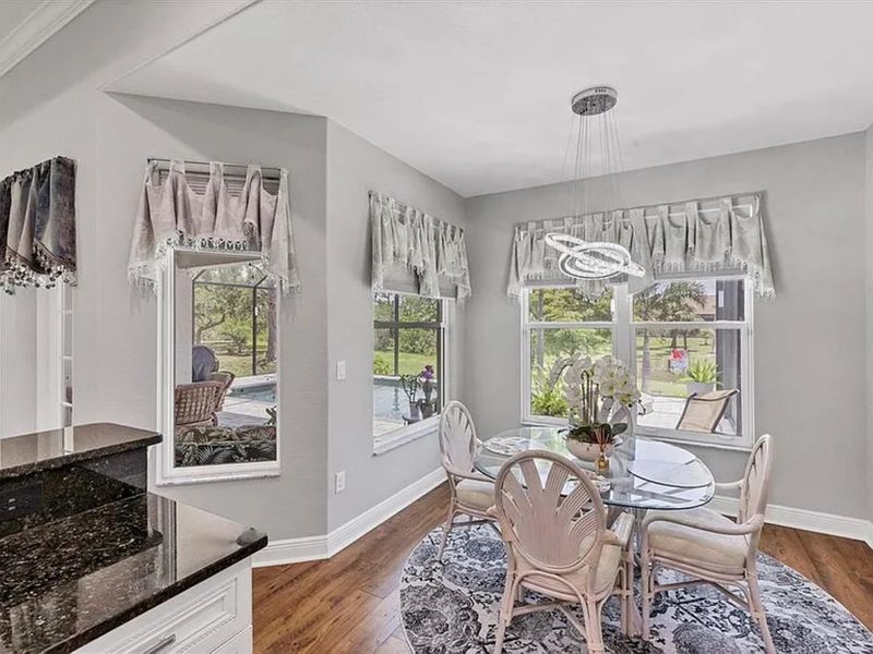 Kitchen nook. Kitchen table seats 4