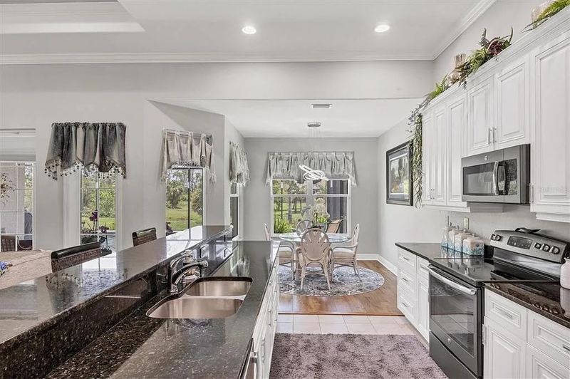 Bright, fully-equipped kitchen with lots of countertop and storage space