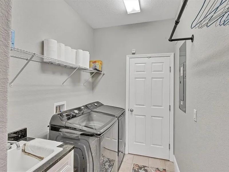 Laundry room with full-size washer & dryer
