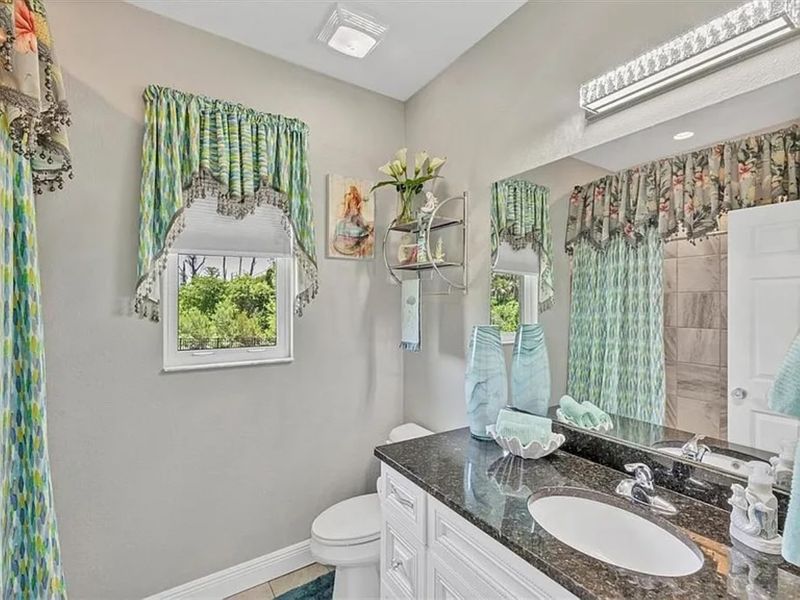 Guest bathroom with shower/tub combo