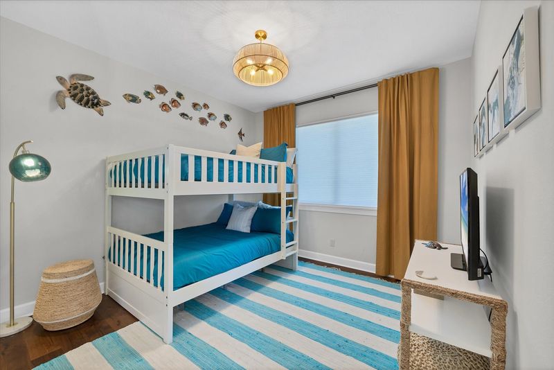 Guest bedroom 2 with double over double bunkbed and 43-inch Smart TV