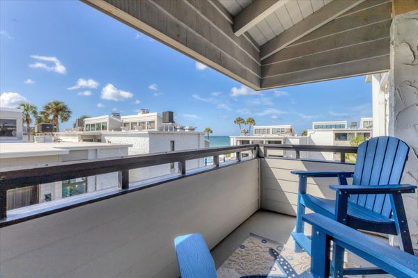 Balcony with view of pool and Gulf