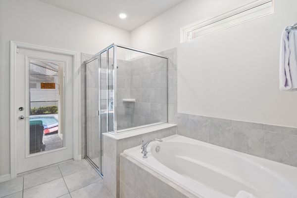 Master King Bathroom 1 Downstairs Tub & Shower Door To Pool