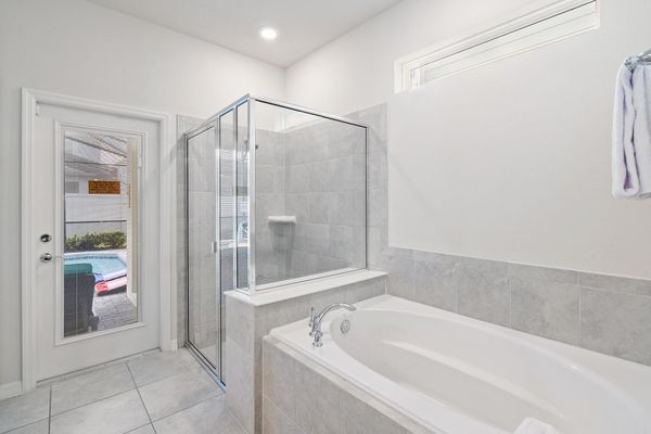 Master King Bathroom 1 Downstairs Tub & Shower Door To Pool