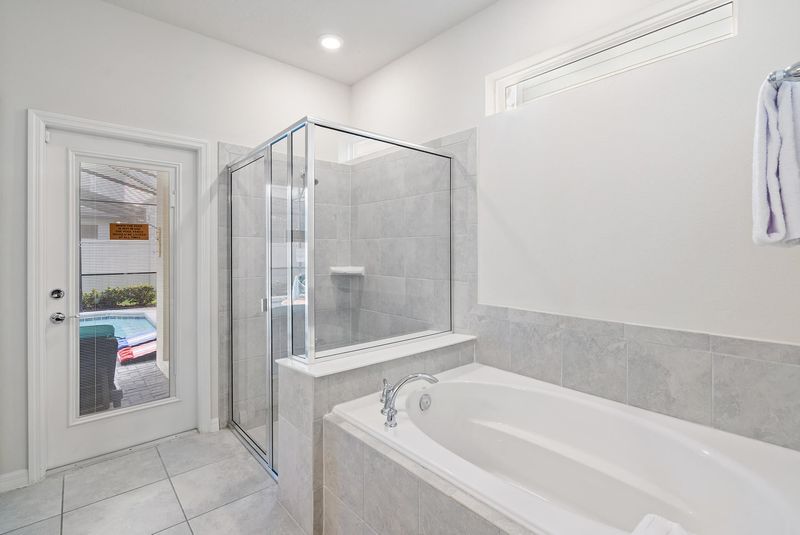 Master King Bathroom 1 Downstairs Tub & Shower Door To Pool