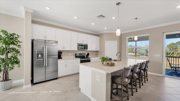 Gorgeous, fully-equipped kitchen with all new appliances and large kitchen island that seats 4