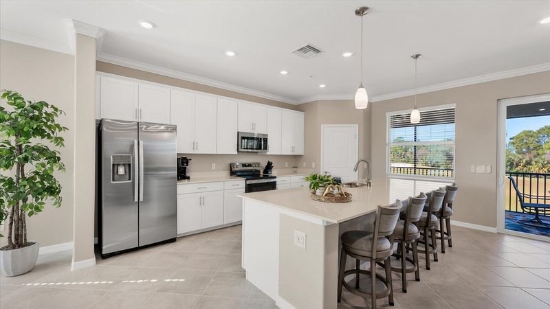 Gorgeous, fully-equipped kitchen with all new appliances and large kitchen island that seats 4