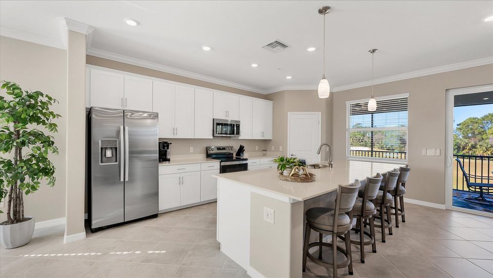 Gorgeous, fully-equipped kitchen with all new appliances and large kitchen island that seats 4