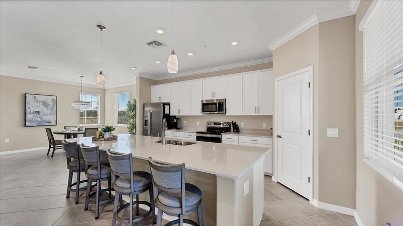 Gorgeous, fully-equipped kitchen with all new appliances and large kitchen island that seats 4