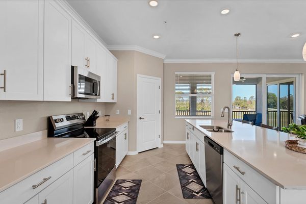 Gorgeous, fully-equipped kitchen with all new appliances and large kitchen island that seats 4