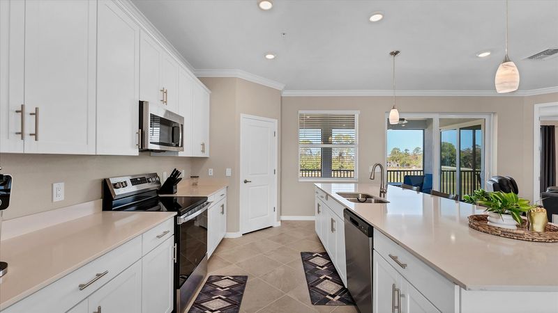 Gorgeous, fully-equipped kitchen with all new appliances and large kitchen island that seats 4