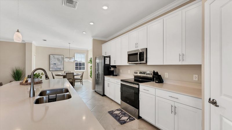 Gorgeous, fully-equipped kitchen with all new appliances and large kitchen island that seats 4
