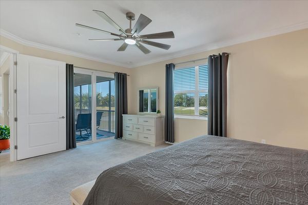 Primary bedroom with king bed and attached bathroom