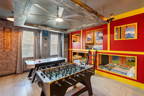 Game Room / Bedroom 8 
Three Double/Double Bunks
65" Roku TV
Two 32" Roku TVs with Game Consoles
Foosball  Air Hockey