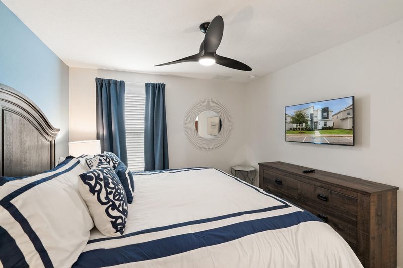 King Suite Bedroom 6 Upstairs
Attached Bathroom 
43" Smart TV