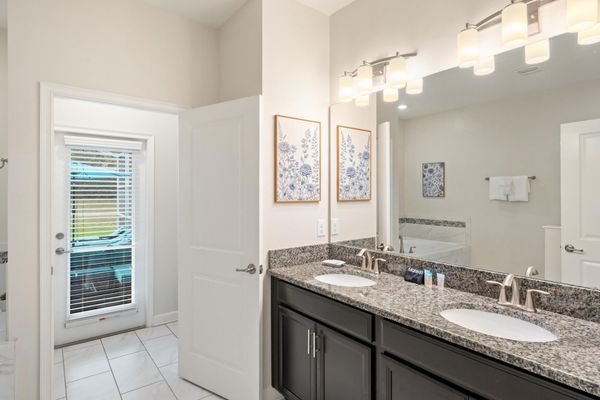 Master King Bathroom 1 Downstairs Tub & Shower Door to Pool