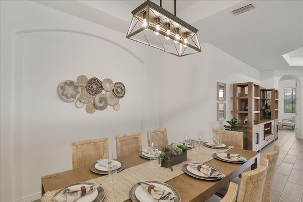 Dining area. Dining table seats 8with additional seating for 4 at the kitchen island