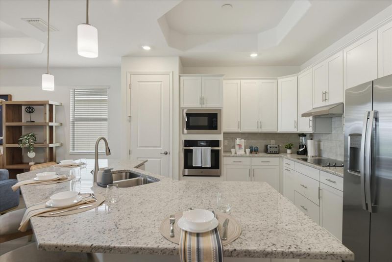 Bright, open, fully-equipped kitchen