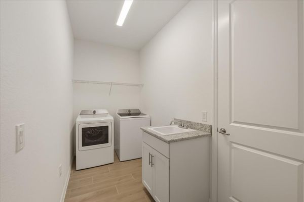 Laundry room with full-size washer & dryer