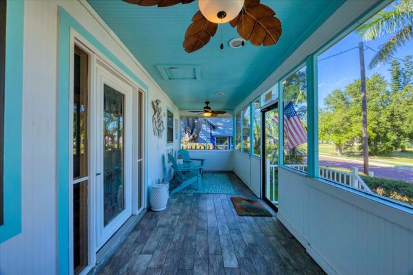 Private front porch overlooiing the cobblestone street