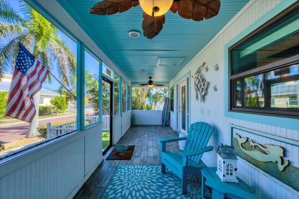 Private front porch overlooiing the cobblestone street