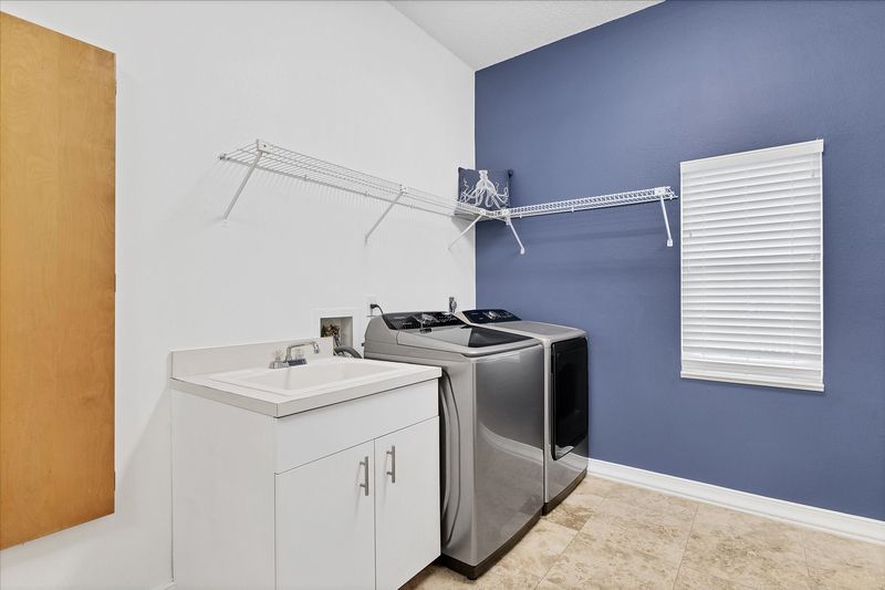 Laundry room with full-size washer & dryer