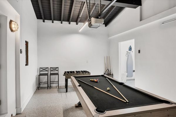 Game room in garage with pool table & foosball