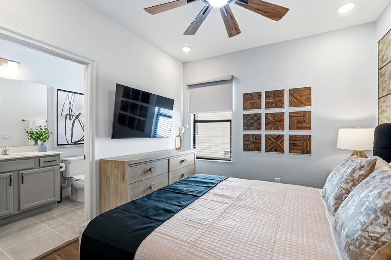 Queen Suite Bedroom 7 Upstairs Attached Bathroom
55" Smart TV