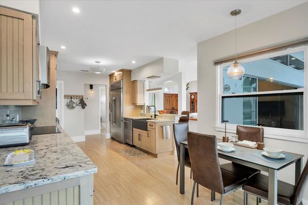 Beautiful, bright, fully-equipped kitchen. Kitchen nook table seats 4 and overlooks pool and canal