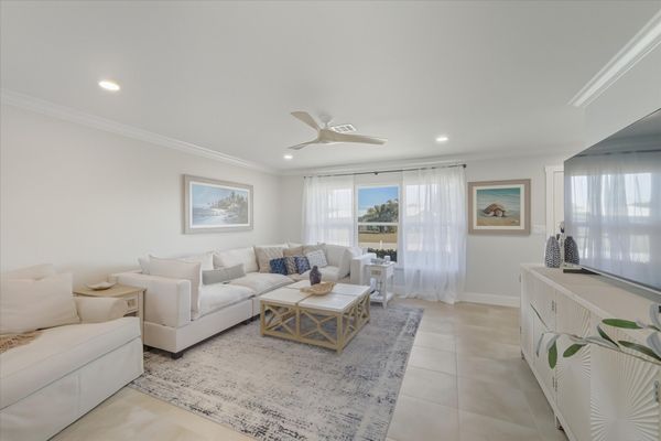 Open living space features lots of comfy seating and 65-inch Smart TV