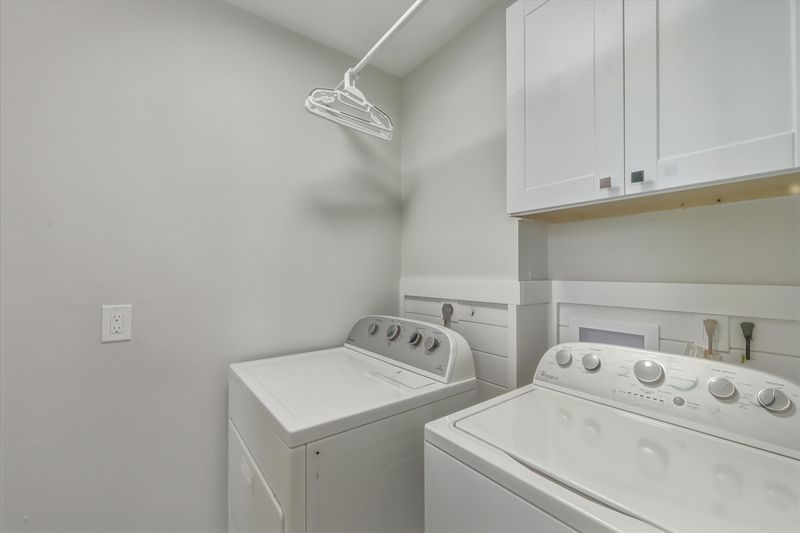 Laundry room with full-size washer & dryer