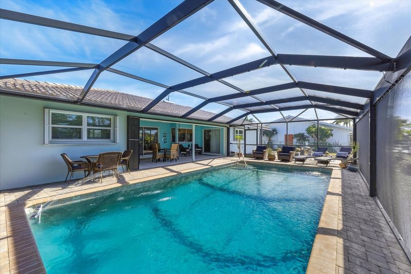 Sparkling pool overlooking the canal. Pool size: 30' x 115' x 6'