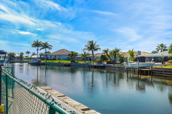 Don't forget the boat! Dock size: 14' x 4' with water supply