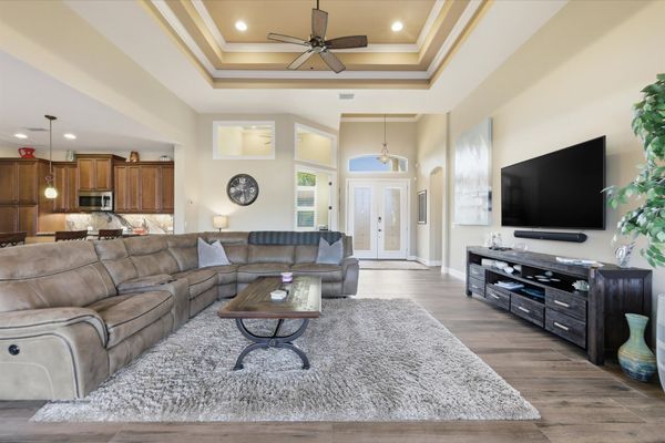 Living room with comfy seating and 70-inch Smart TV