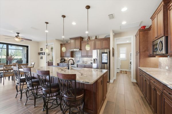 Beautiful, fully-equipped kitchen overlooking the living room and dining area