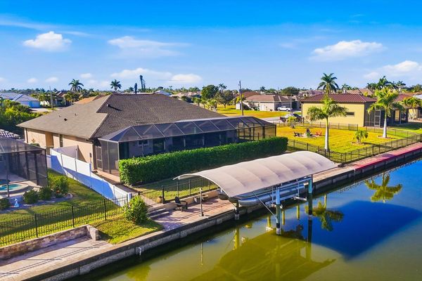 Gorgeous 3 bedroom, 2 bathroom waterfront home with private pool in South Gulf Cove. (boat lift is not for guest use)
