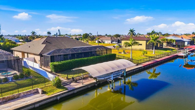 Gorgeous 3 bedroom, 2 bathroom waterfront home with private pool in South Gulf Cove. (boat lift is not for guest use)