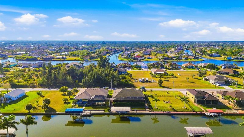 Gorgeous 3 bedroom, 2 bathroom waterfront home with private pool in South Gulf Cove. (boat lift is not for guest use)