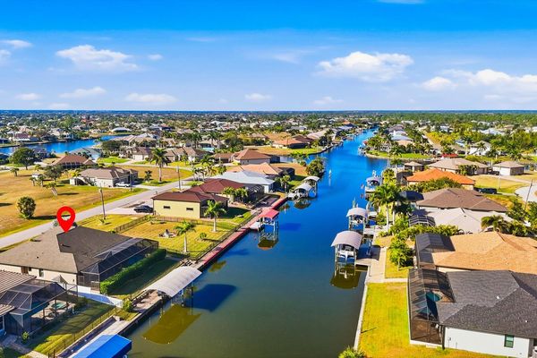 Gorgeous 3 bedroom, 2 bathroom waterfront home with private pool in South Gulf Cove. (boat lift is not for guest use)
