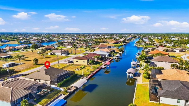 Gorgeous 3 bedroom, 2 bathroom waterfront home with private pool in South Gulf Cove. (boat lift is not for guest use)