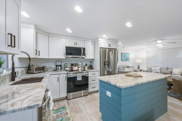 Bright, open, fully-equipped kitchen