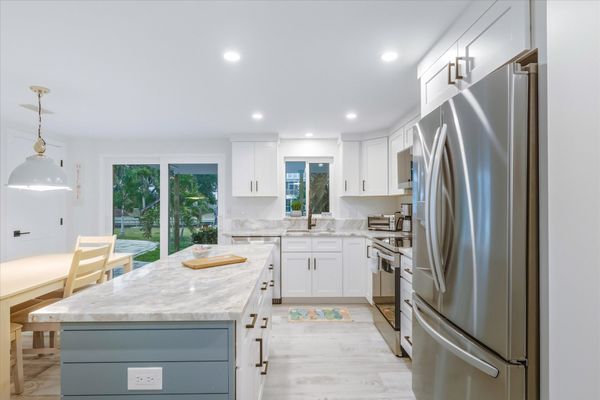 Bright, open, fully-equipped kitchen