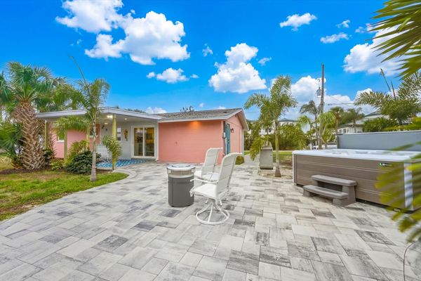 Hot tub and fire pit area overlooking the canal