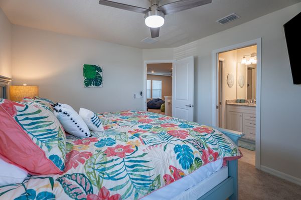 King Suite Bedroom 4 Upstairs, Attached Bathroom 
65" Smart TV