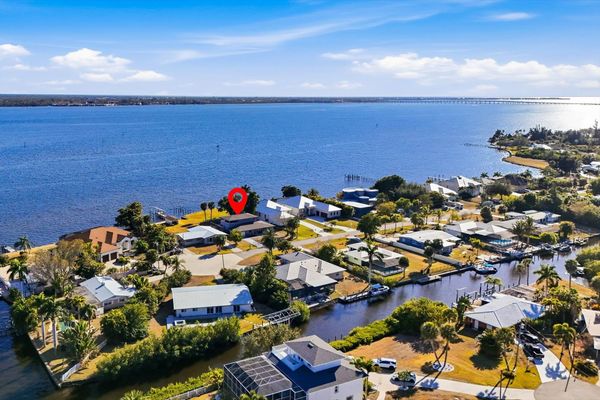 Gorgeous 4 bedroom, 3 bathroom, 2 story waterfront home with private pool on Peace River in Punta Gorda, FL