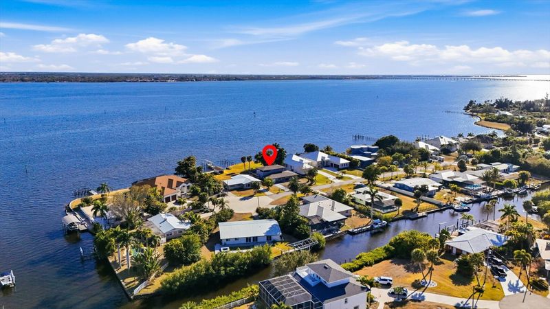 Gorgeous 4 bedroom, 3 bathroom, 2 story waterfront home with private pool on Peace River in Punta Gorda, FL